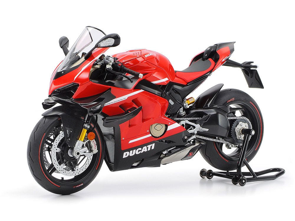 Tamiya 1/12 Ducati Superleggera V4 kit, built and painted model in red and black, front left view on stand