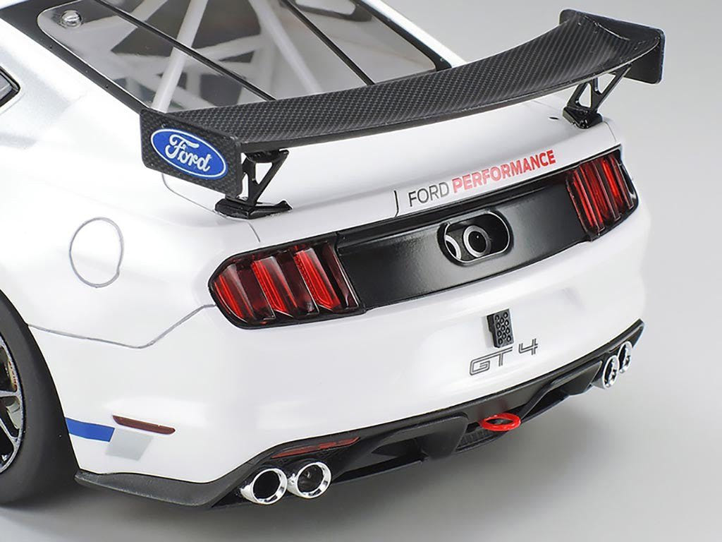 Tamiya 1/24 Ford Mustang GT4 kit, close-up of rear wing, lights and exhausts on white build