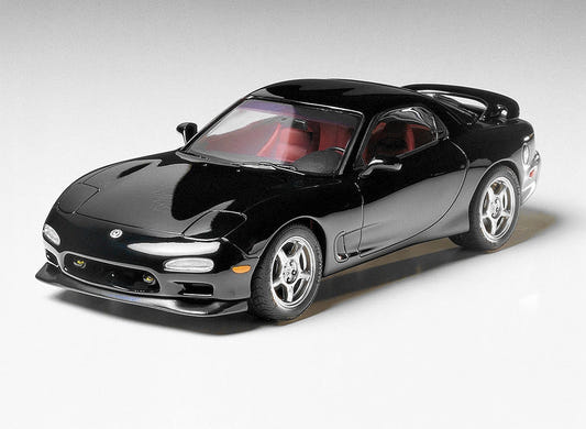 Tamiya 1/24 Mazda RX-7 R1 kit, built model in black, front three-quarter view