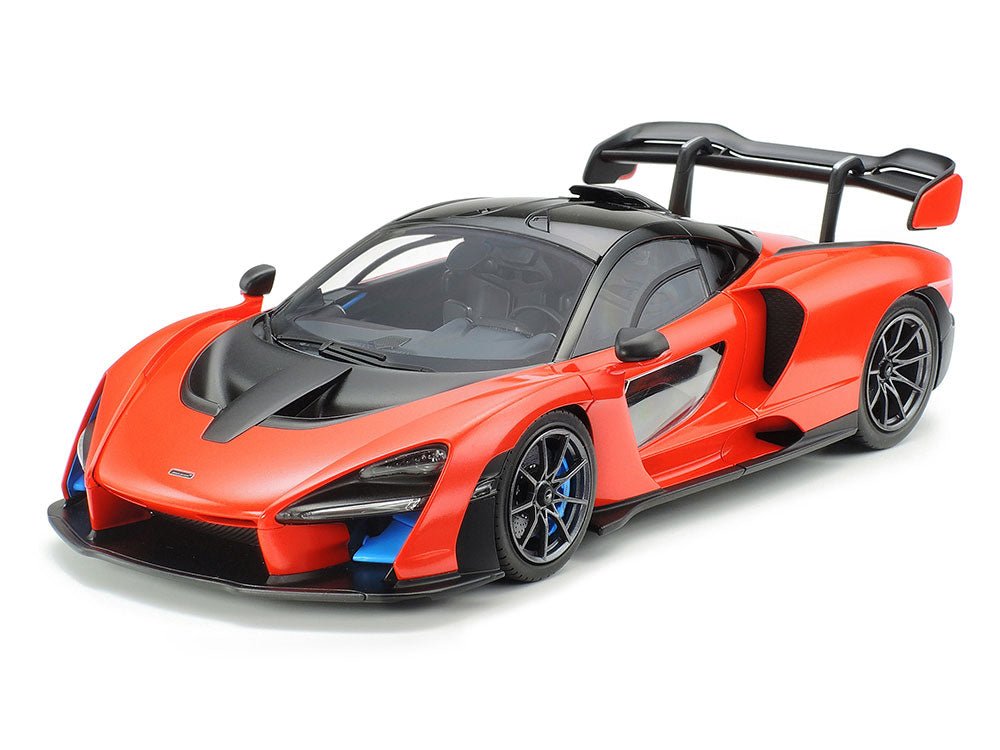Tamiya 1/24 McLaren Senna kit, built model in orange with carbon black roof, front three-quarter view