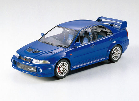 Tamiya 1/24 Mitsubishi Lancer Evolution VI kit, built model in blue, front three-quarter view