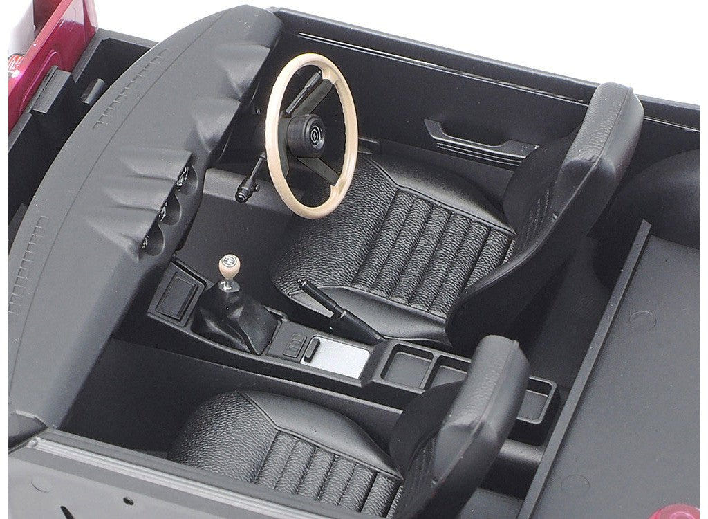 Tamiya 1/24 Nissan Fairlady 240ZG kit, close-up of interior with seats and wooden steering wheel