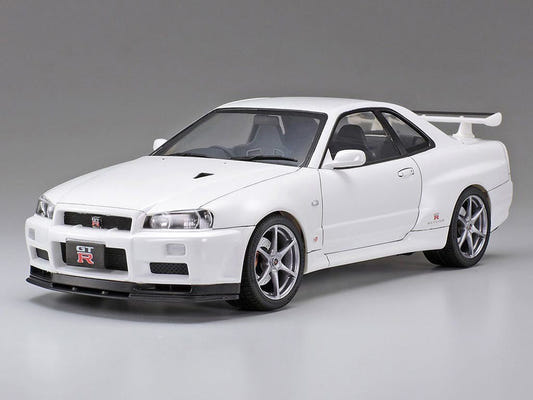 Tamiya 1/24 Nissan Skyline GT-R V-Spec II kit, built model in white, front three-quarter view