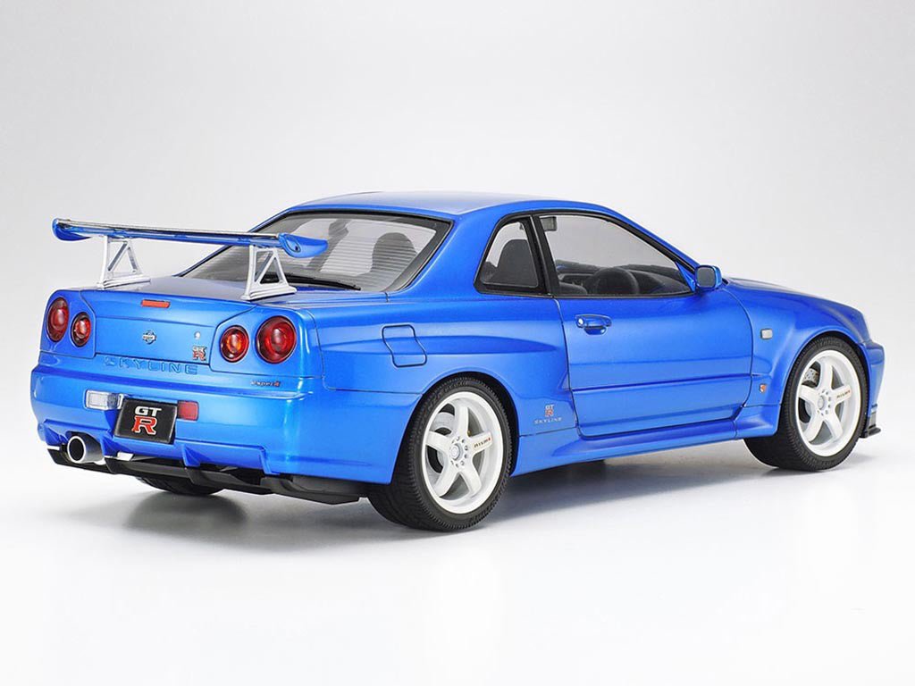 Tamiya 1/24 Nissan Skyline GT-R V-Spec II kit, built model in blue, rear three-quarter view