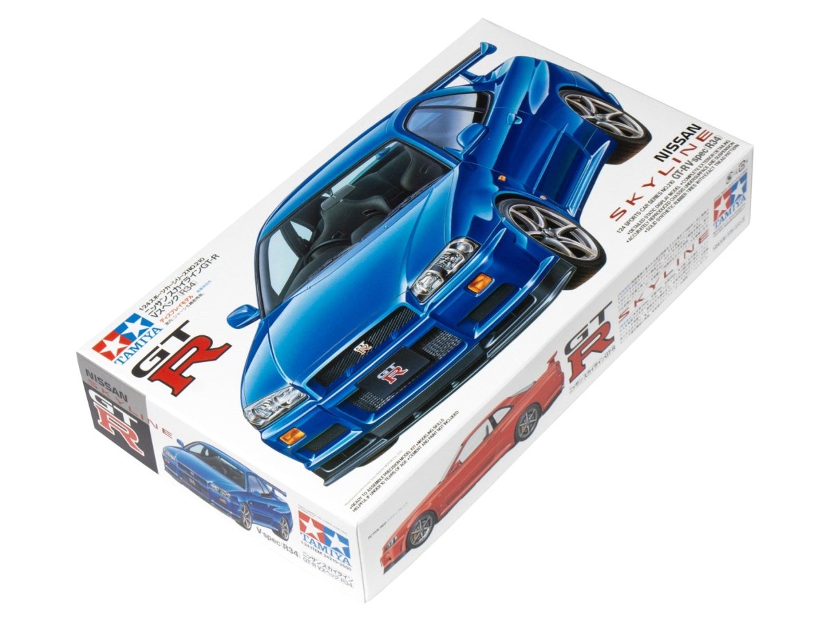 Tamiya 1/24 Nissan Skyline GT-R V-Spec R34 kit, the kit box shown at an angle