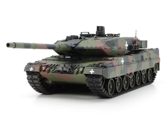 Tamiya 1/35 Leopard 2 A6 Ukraine kit, built model in camouflage with white crosses, front three-quarter view