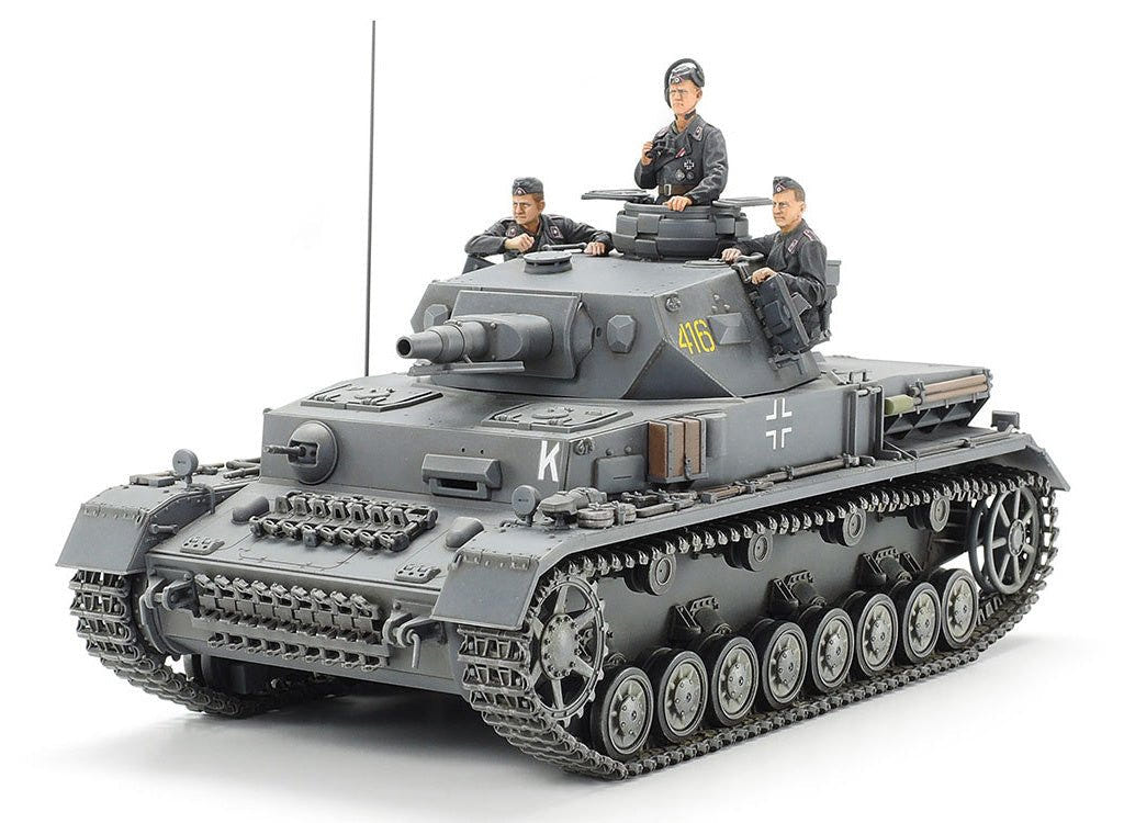 Tamiya 1/35 Panzer IV Ausf.F kit, built model in grey with three crew figures, front three-quarter view