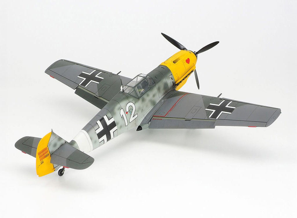 Tamiya 1/48 Messerschmitt Bf 109E-4/7 Trop kit, built grey model with yellow tail, rear three-quarter view