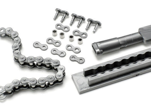 Tamiya 1/6 Honda link-type assembly chain set, metal chain links, joining plates and assembly jig laid out