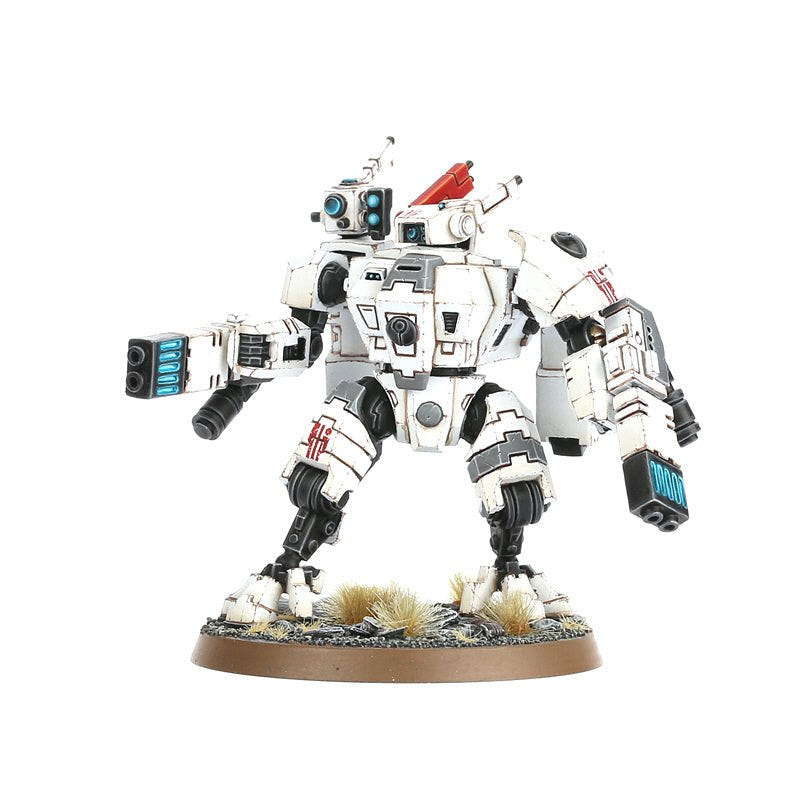Painted T'au Crisis Battlesuit in white armour with red trim on a desert base, front view