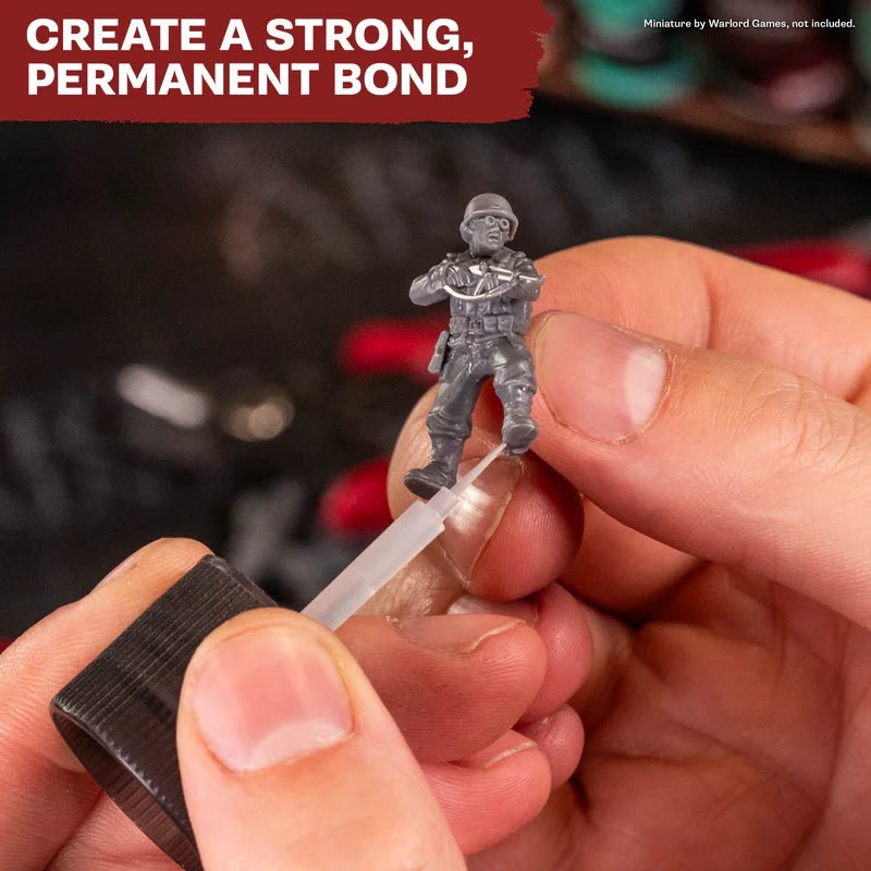 Gluing a plastic miniature with The Army Painter Thin Plastic Glue brush applicator