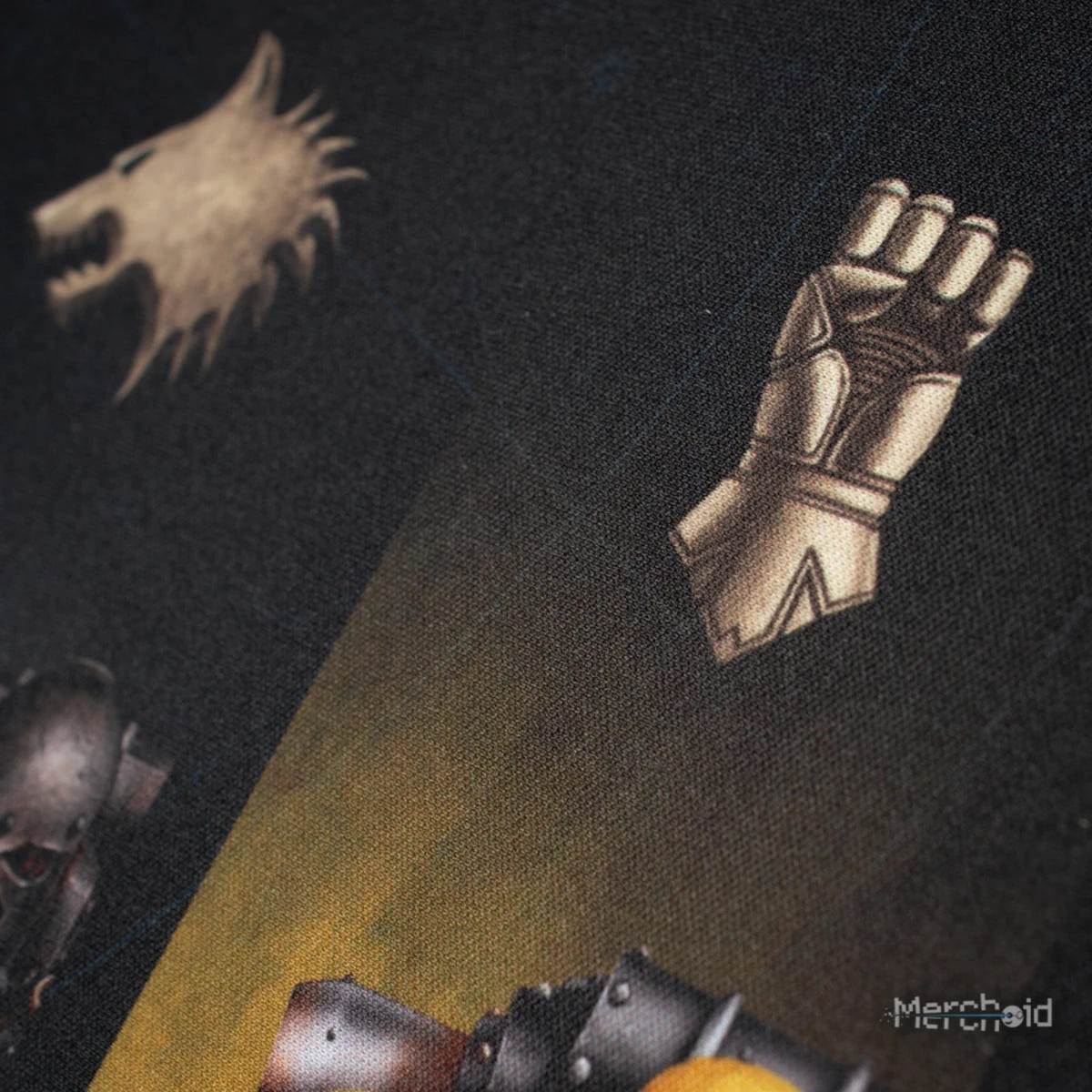 Close-up of the desk mat's wolf head and gauntlet Legion symbols