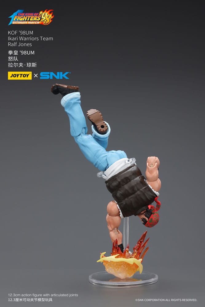 JoyToy King of Fighters '98 Ralf Jones figure diving head-first onto flame effect on clear stand, on grey
