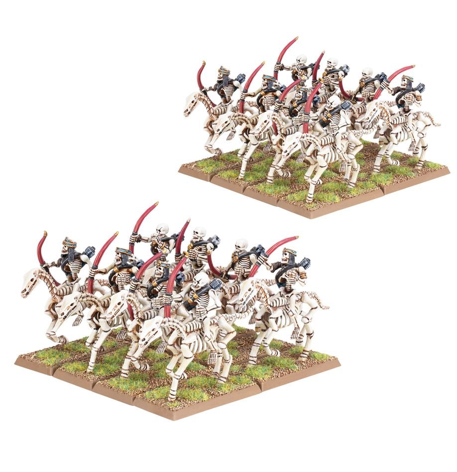 Two painted regiments of Tomb Kings Skeleton Horsemen armed with bows on rectangular bases