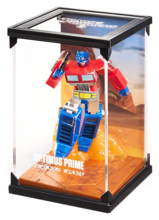 Noble Collection Transformers Optimus Prime diorama figure in a clear acrylic display case