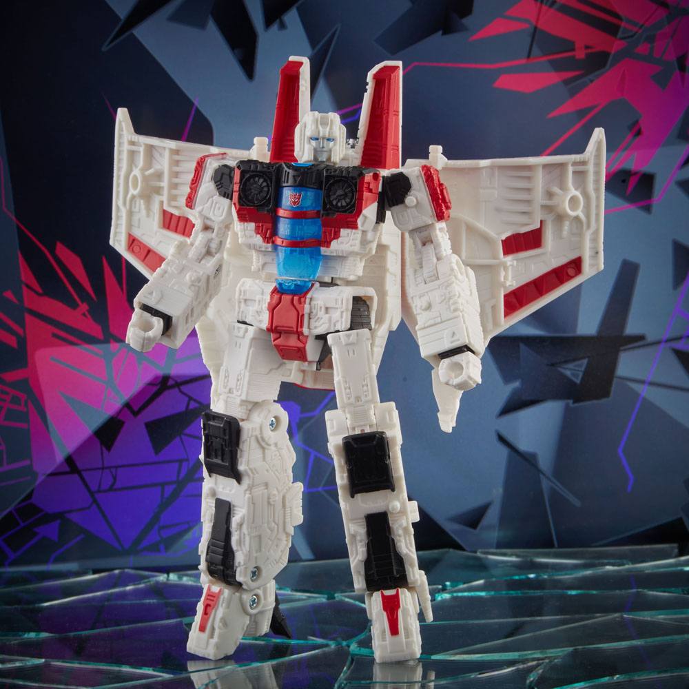 Shattered Glass Starscream robot mode standing against a dark shattered-glass backdrop