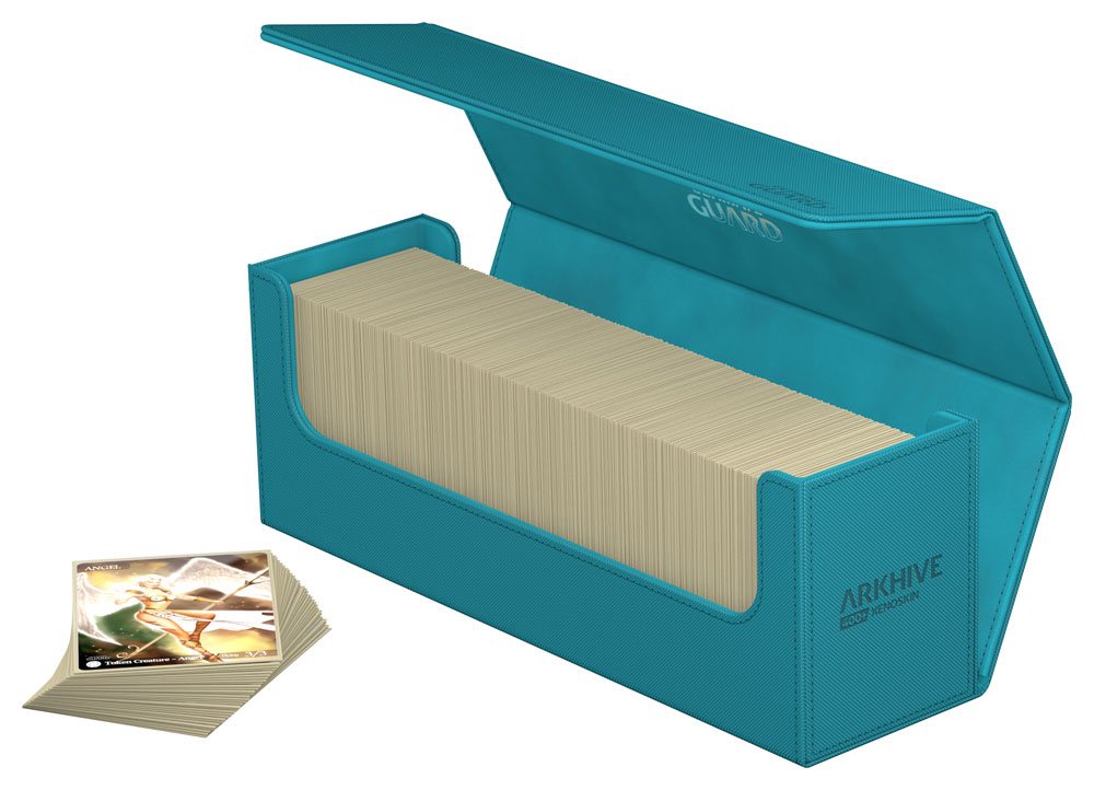 Ultimate Guard Arkhive 400+ Xenoskin card box, petrol, open and filled with sleeved cards, a stack of cards beside it
