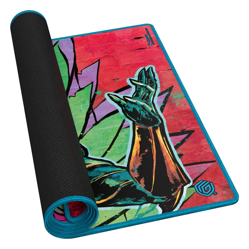 Ultimate Guard MTG Aetherdrift Hazoret play-mat, partly rolled, showing black rubber underside