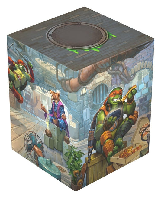 Ultimate Guard Boulder 100+ MTG x TMNT Turtle Lair deck box, closed, Michelangelo with pizza in the sewer lair