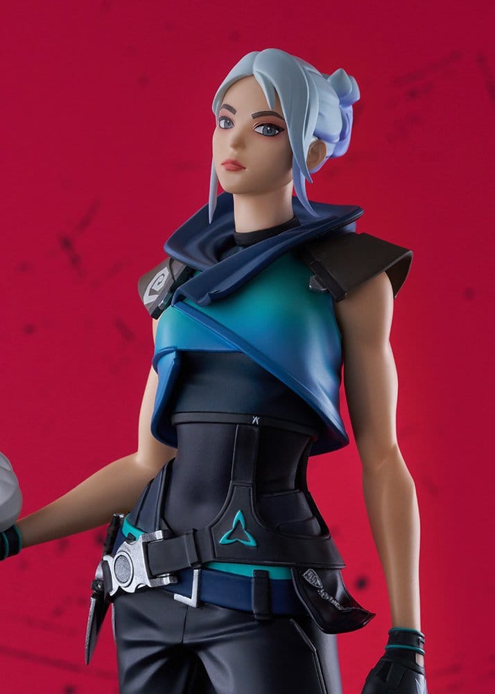 Close-up of Jett's face, white hair bun and teal hooded top on the Valorant figure