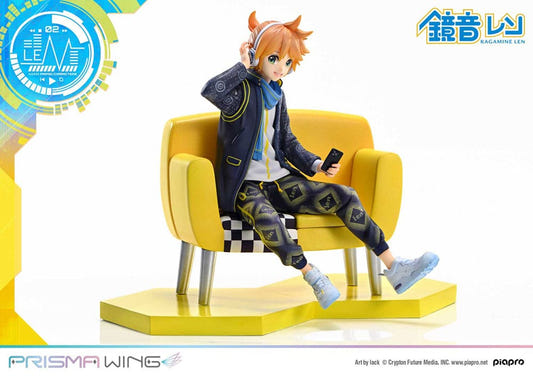 Prime 1 Studio Prisma Wing Kagamine Len 1/7 statue lounging on a yellow sofa, front view