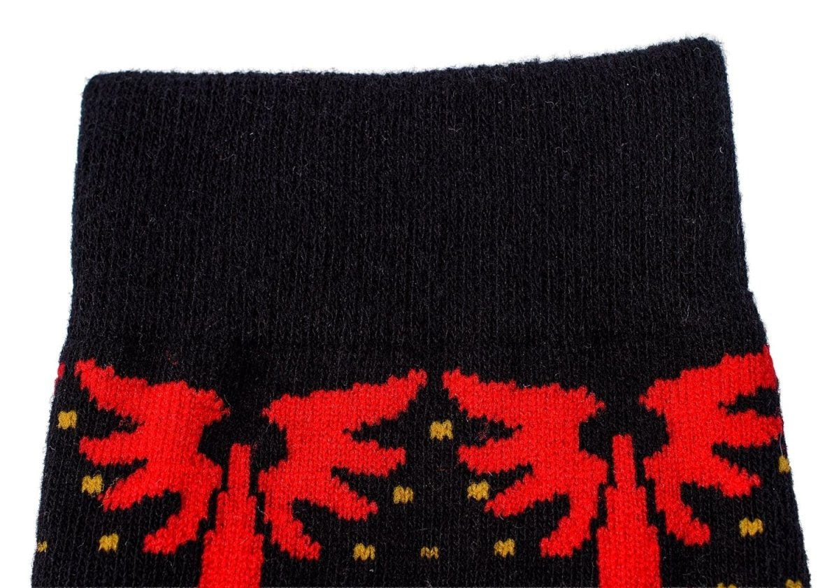 Close-up of the black cuff and Blood Angels emblem band on the socks