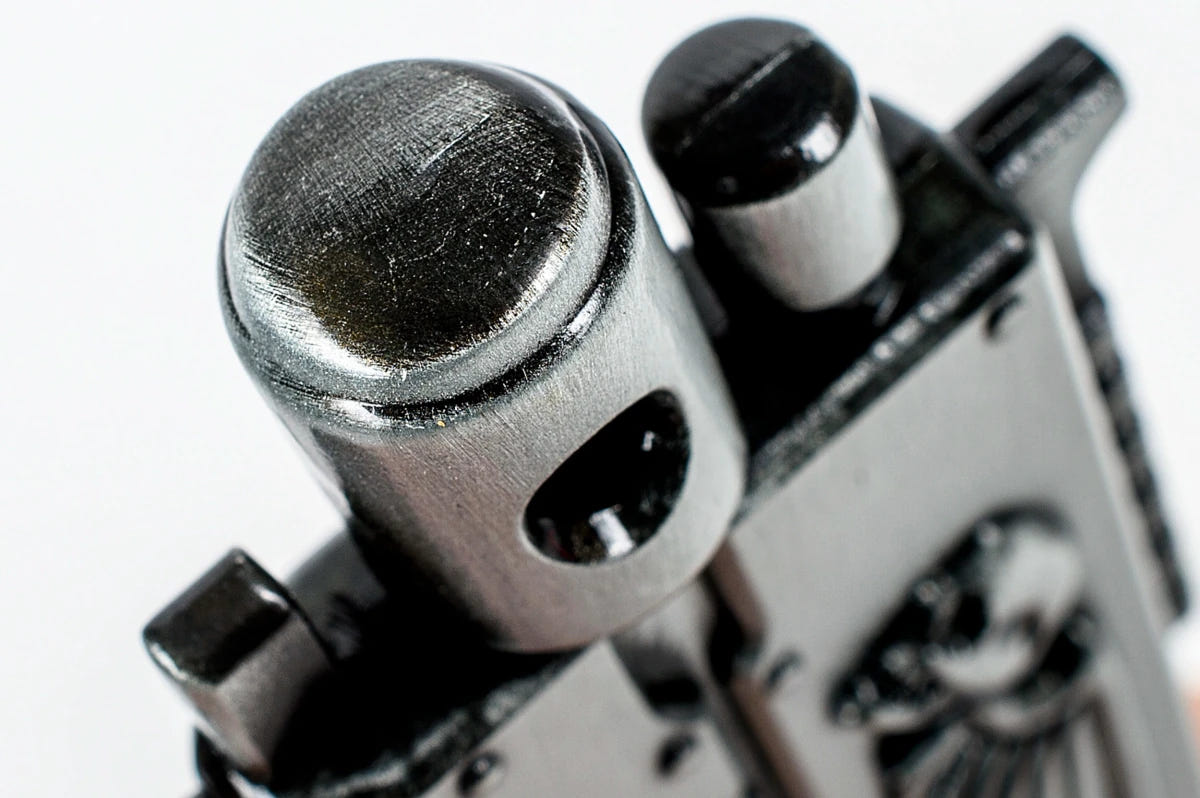 Close-up of the Bolt Rifle bottle opener's muzzle end