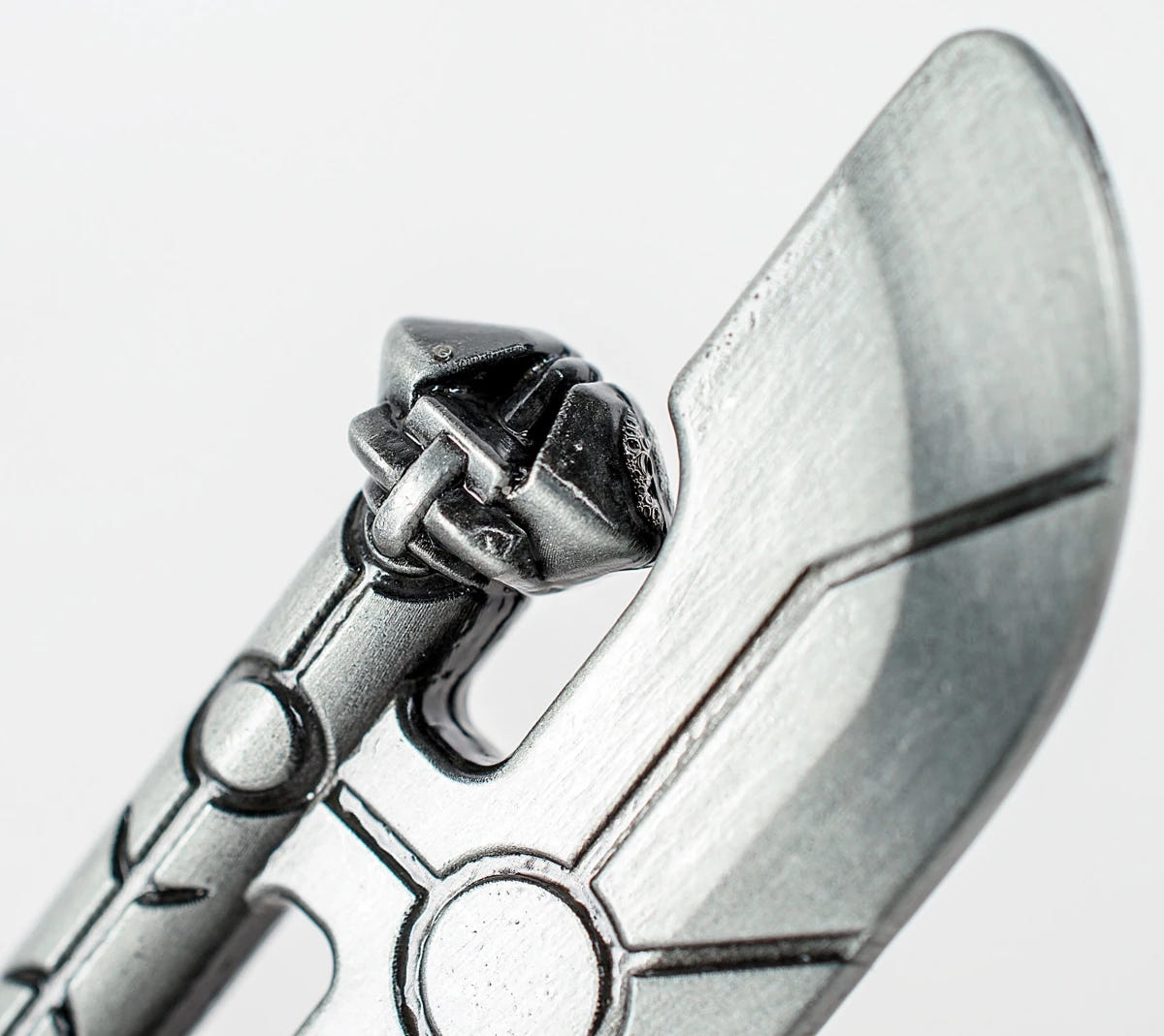 Necron Hyperphase Sword bottle opener, close-up of the curved blade tip and cap hook
