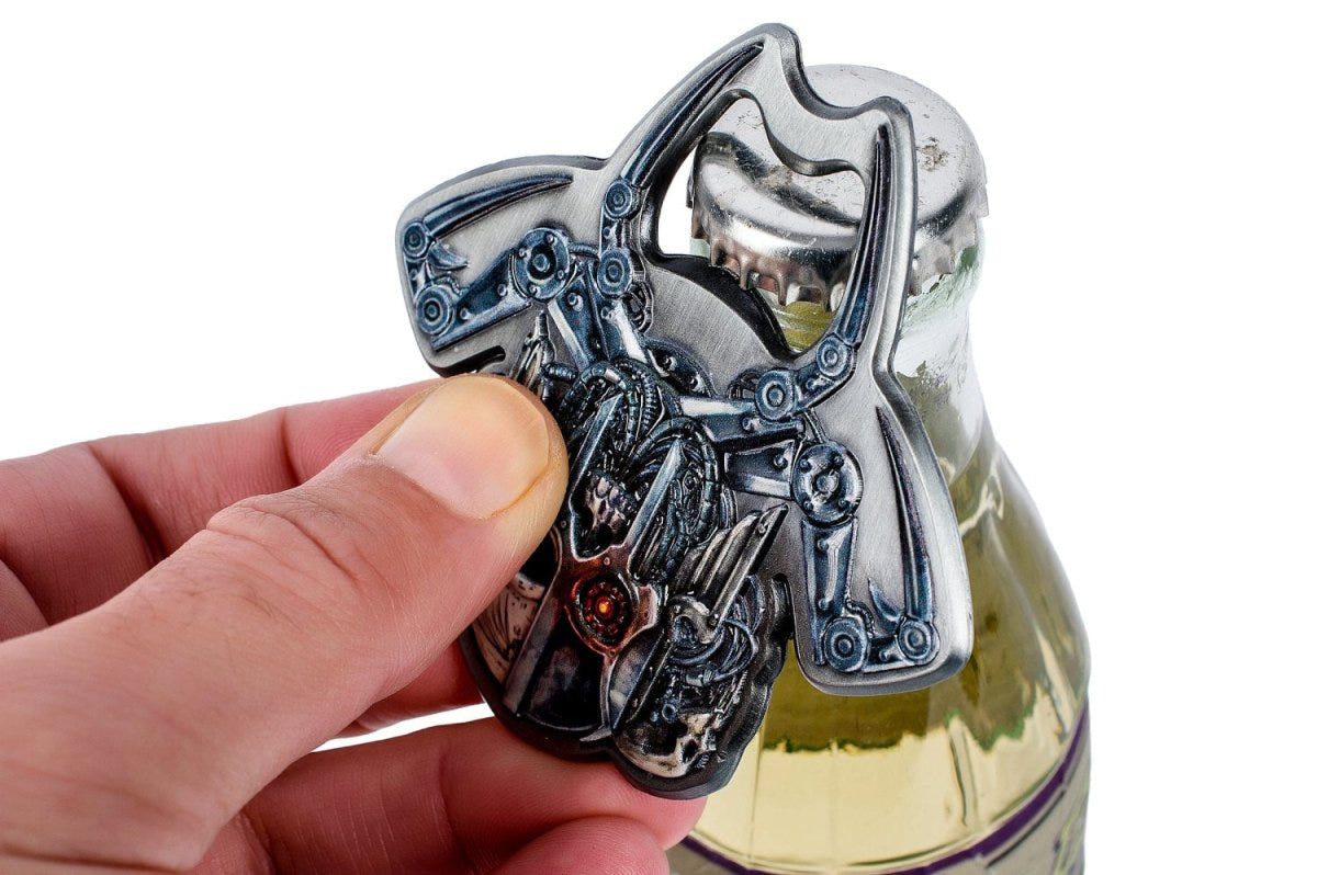 Servo Skull bottle opener hooked under a bottle cap