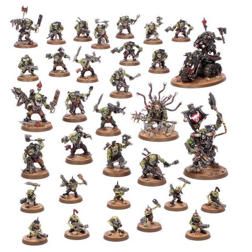 A set of painted fantasy miniature figurines arranged in rows on a plain white background. The figures appear to be a coordinated group of green-skinned monsters, goblins, or orcs, many mounted on round brown bases, with some larger mounted models.