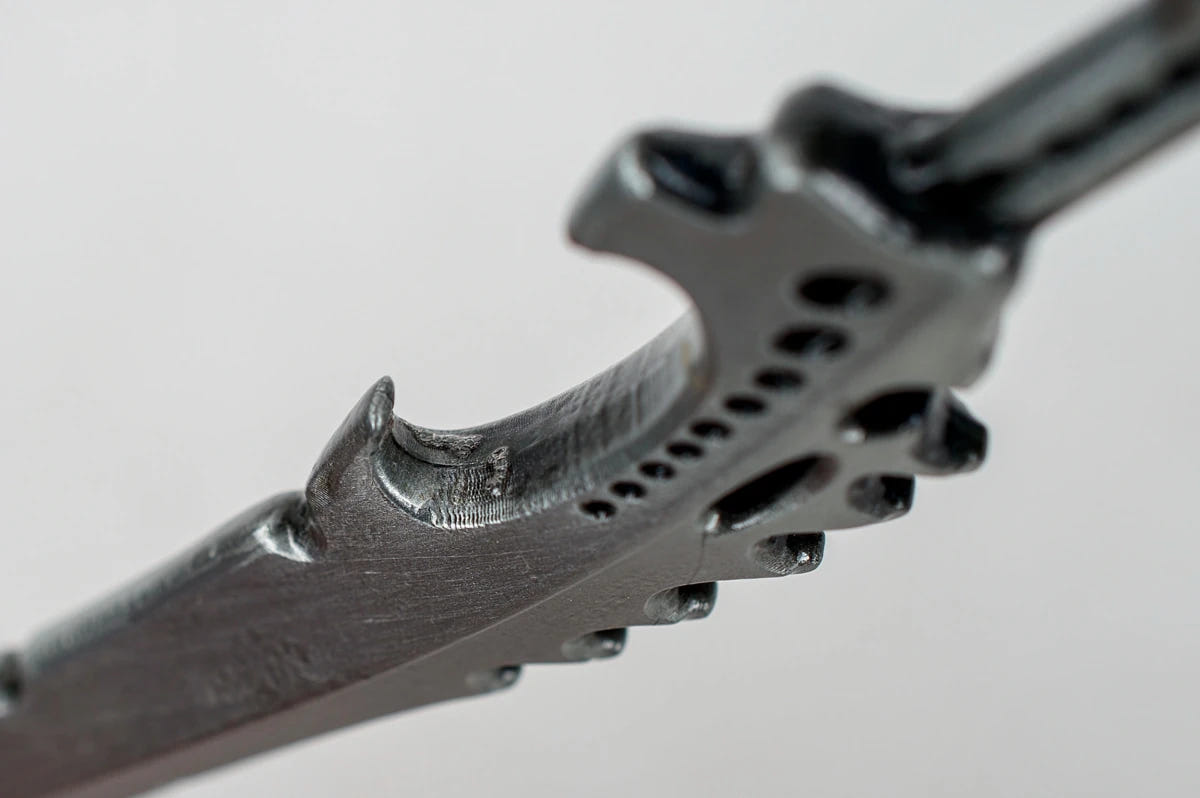 Close-up of the bottle opener notch on the Warhammer 40,000 Bonesword