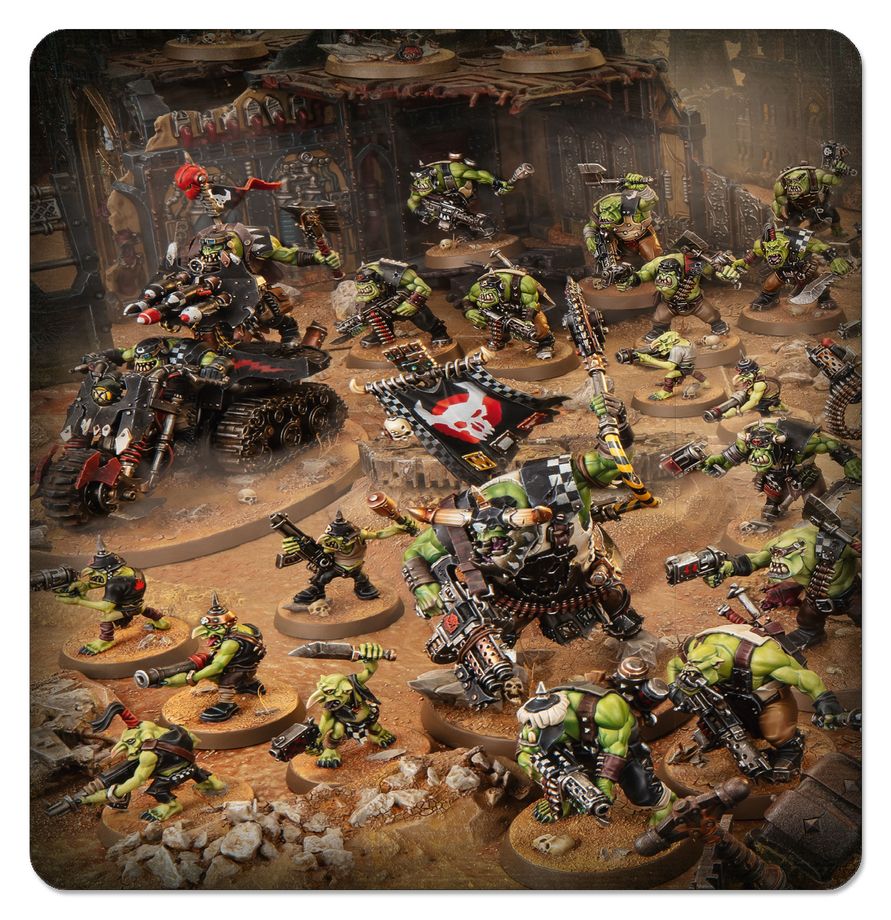A tabletop miniature gaming scene showing multiple painted sci-fi warrior figures and a tank-like vehicle arranged in a dusty arena with a black-and-white flag bearing a red skull. The image appears to be the product artwork itself rather than a real photographed environment, so this fits Scenery rather than Lifestyle or Product/Packaging.