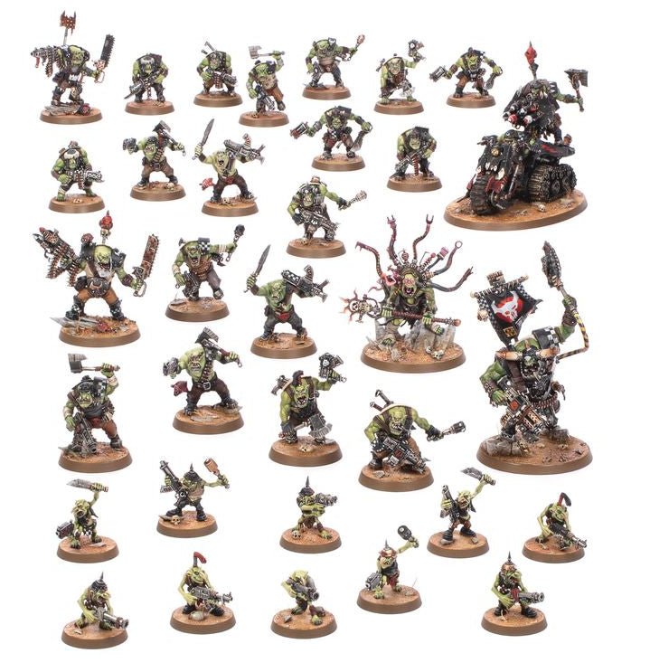 A set of painted fantasy miniature figurines arranged in rows on a plain white background. The figures appear to be a coordinated game-kingdom or race set, with green skin, dark armor, and various weapons, each mounted on a round brown base.