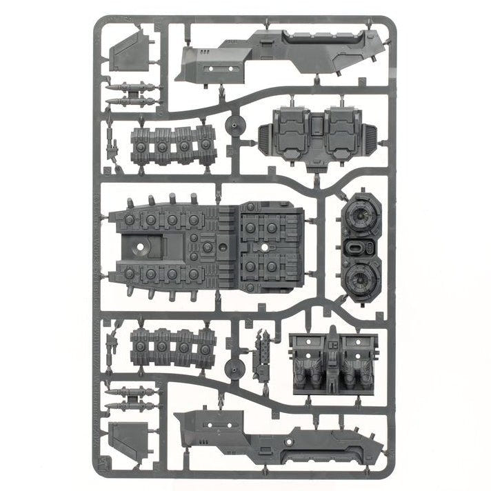 A gray plastic sprue containing multiple unpainted miniature model parts, isolated on a solid white background.