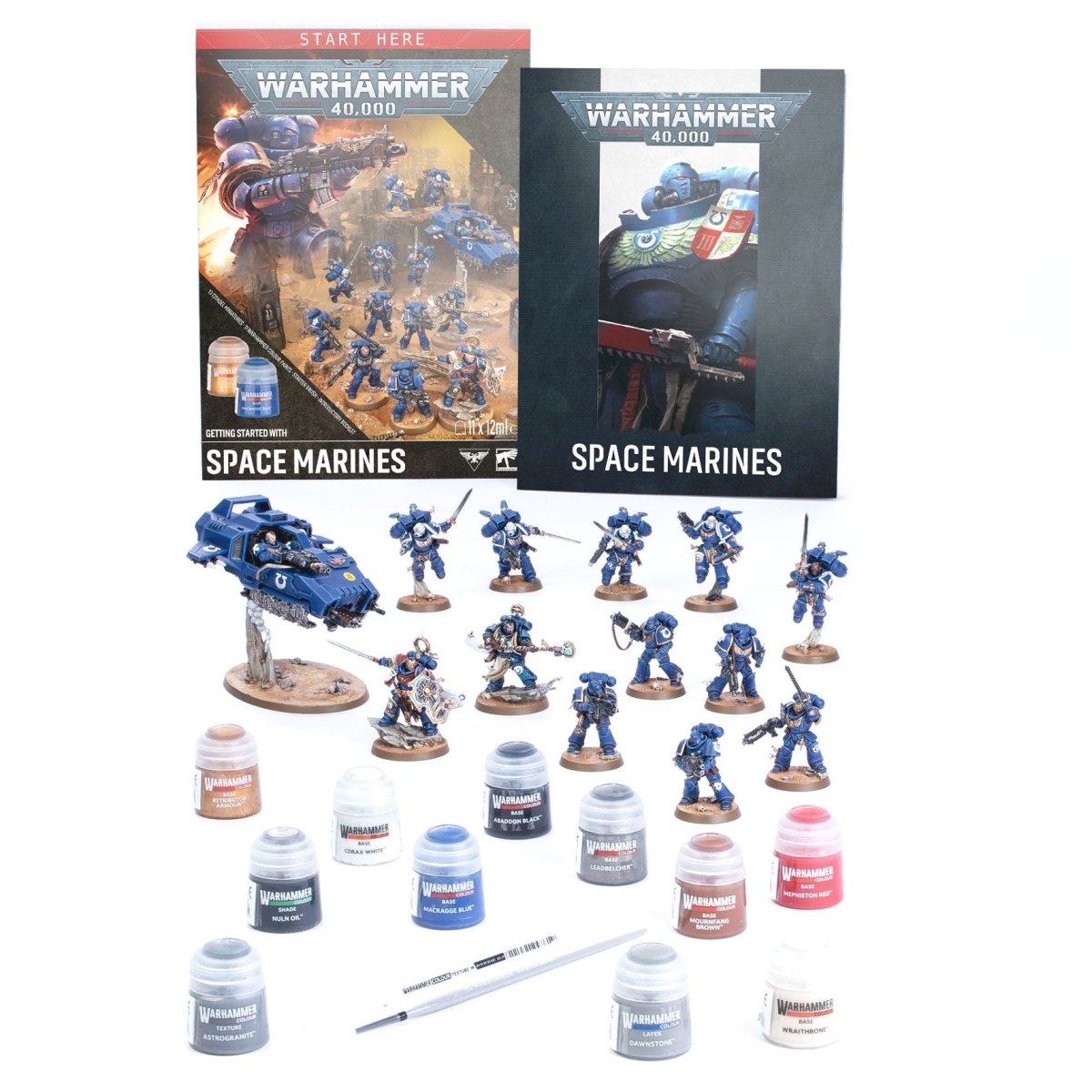 Warhammer 40k Space Marines miniatures kit on a white background, including painted blue space marine figures, a vehicle, small paint bottles, brushes, and two Warhammer 40k Space Marines box cards.