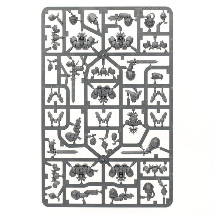 A rectangular gray plastic sprue containing multiple unpainted miniature parts, isolated on a solid white background.