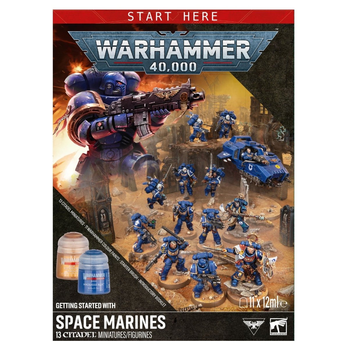 Front cover of the Warhammer 40,000 Space Marines starter box, showing painted miniatures, a blue vehicle, and two small storage boxes on a black background.