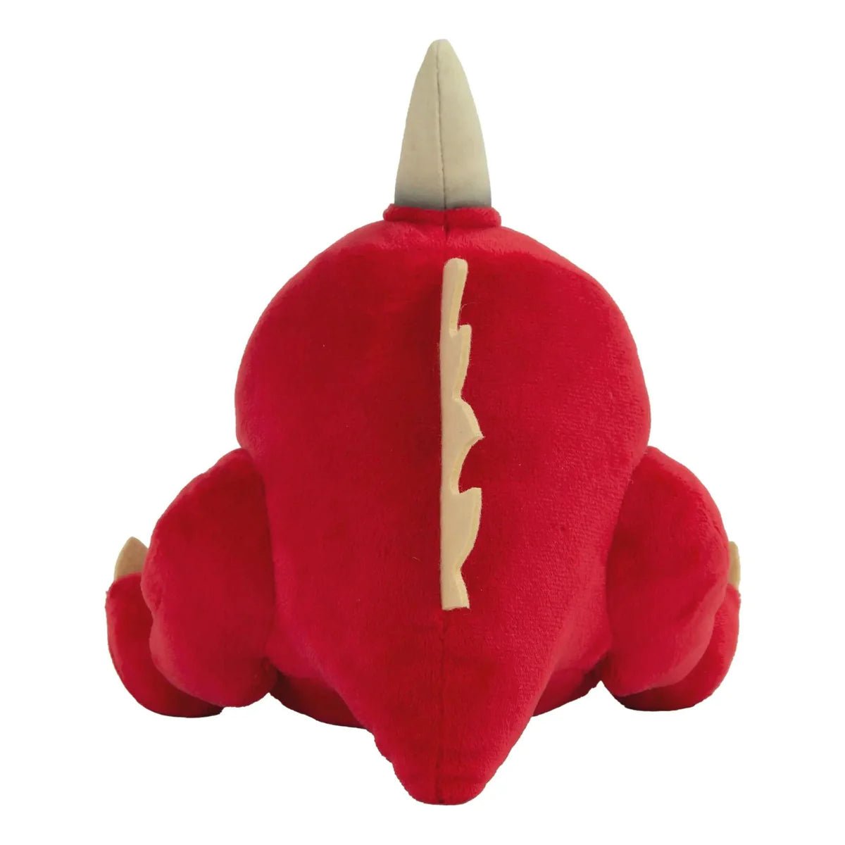 Rear view of the TOMY Gnasha-Squig plush showing its horn and cream back spines