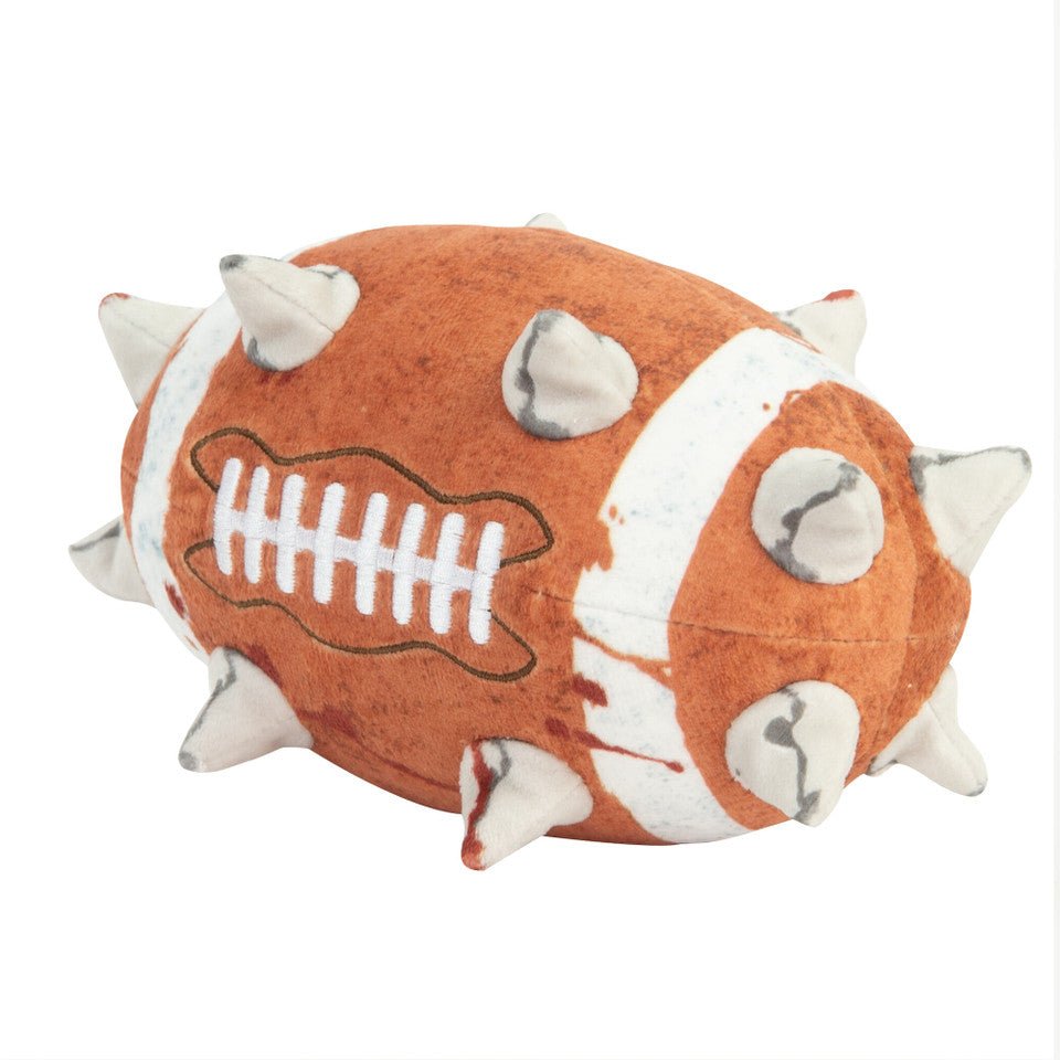 TOMY Blood Bowl ball plush from an angled view with spikes and white stripe