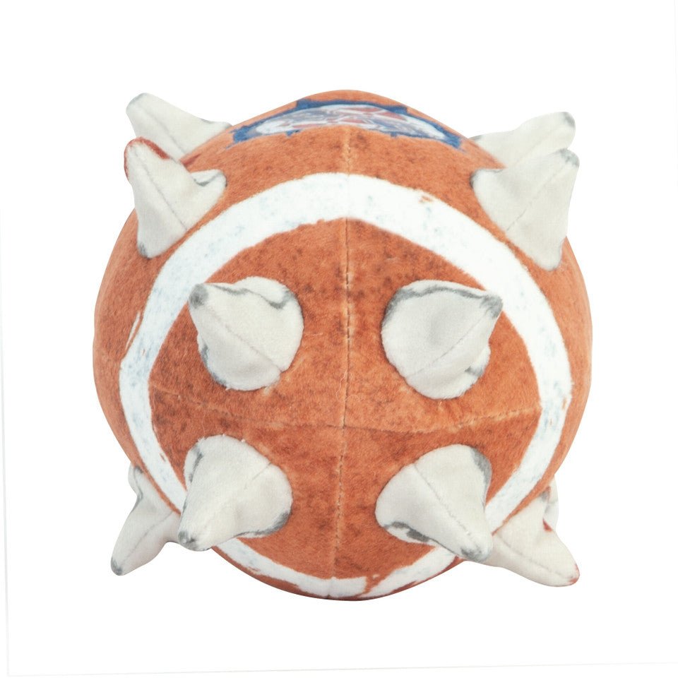 Opposite end of the TOMY Blood Bowl ball plush with its circle of soft spikes