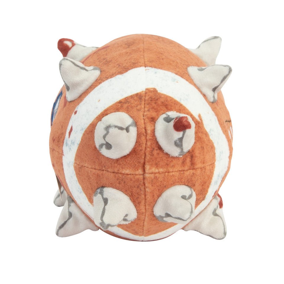 End view of the TOMY Blood Bowl ball plush showing the spiked tip