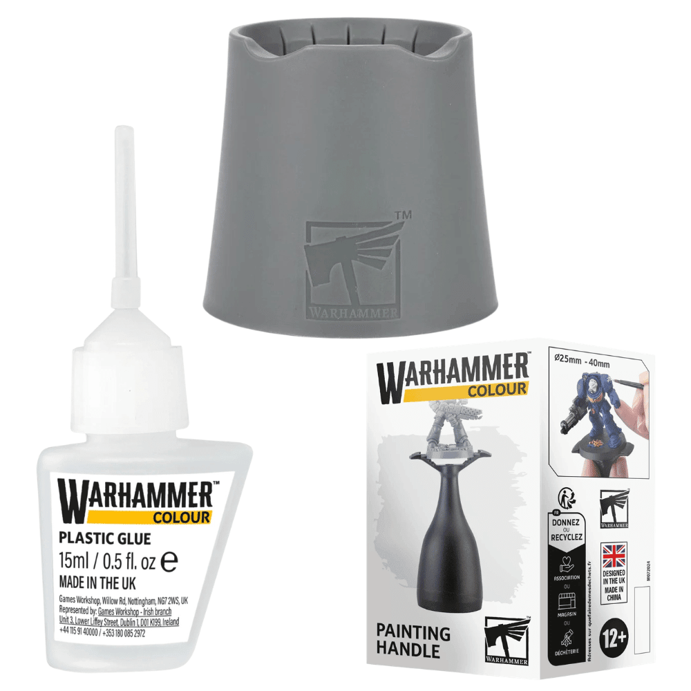 Warhammer product set with plastic glue, painting handle, and color guide on a white background
