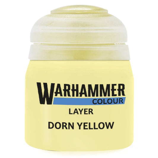 Warhammer paint canister labeled 'Dorn Yellow' on a white background