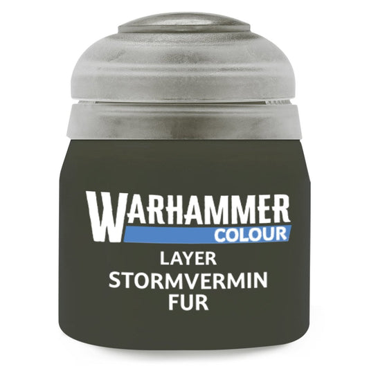 A small jar of Warhammer Colour paint with the shade name 'Layer Stormvermin Fur' printed on the front. The jar is a very dark olive green, and the cap is a textured metallic silver-gray.
