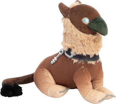 TOMY Balthas Gryph-hound plush side view with key on its black collar and tufted tail