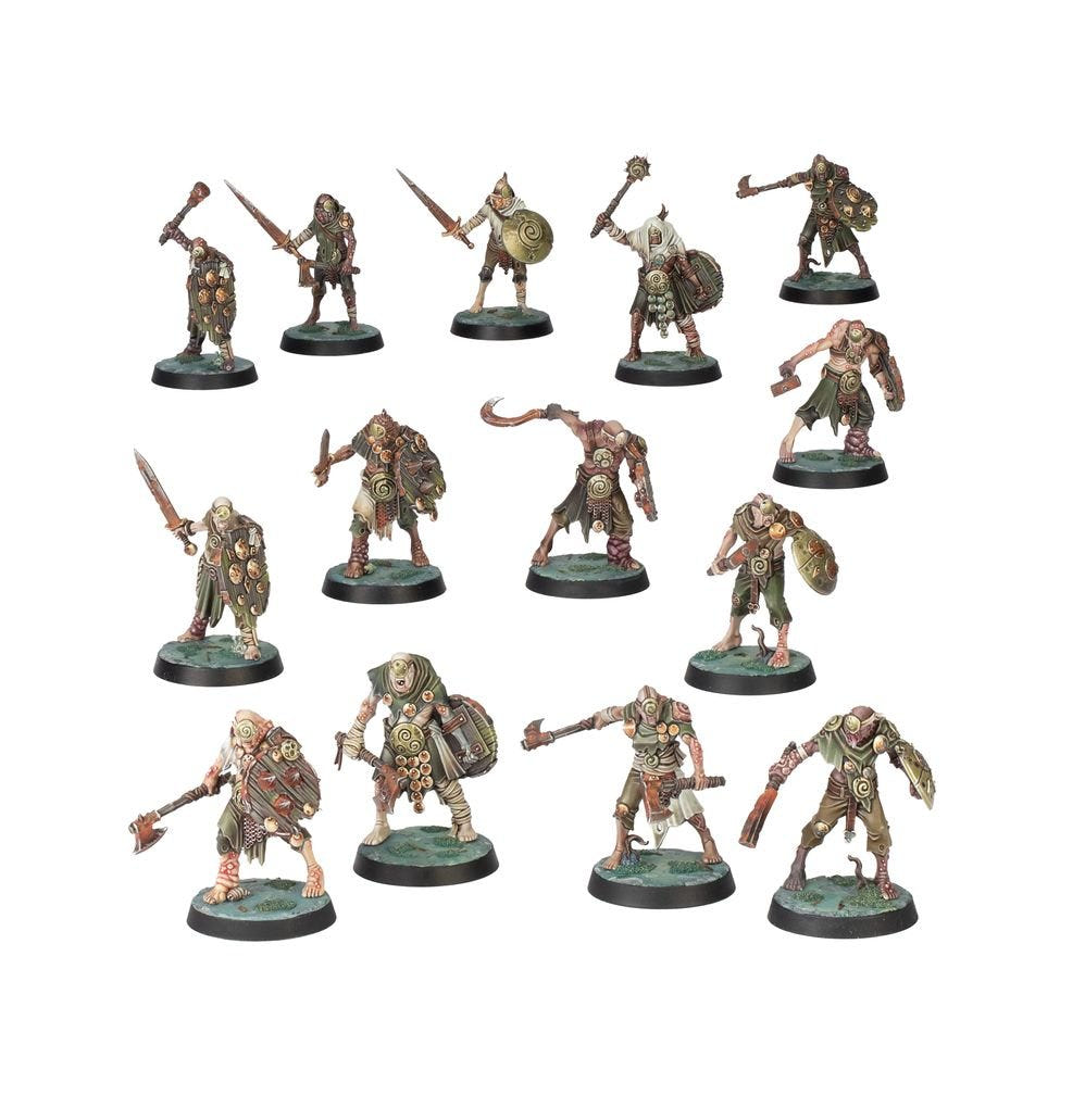 Fourteen painted feral enemy warriors with blades and clubs from Warhammer Quest: Darkwater