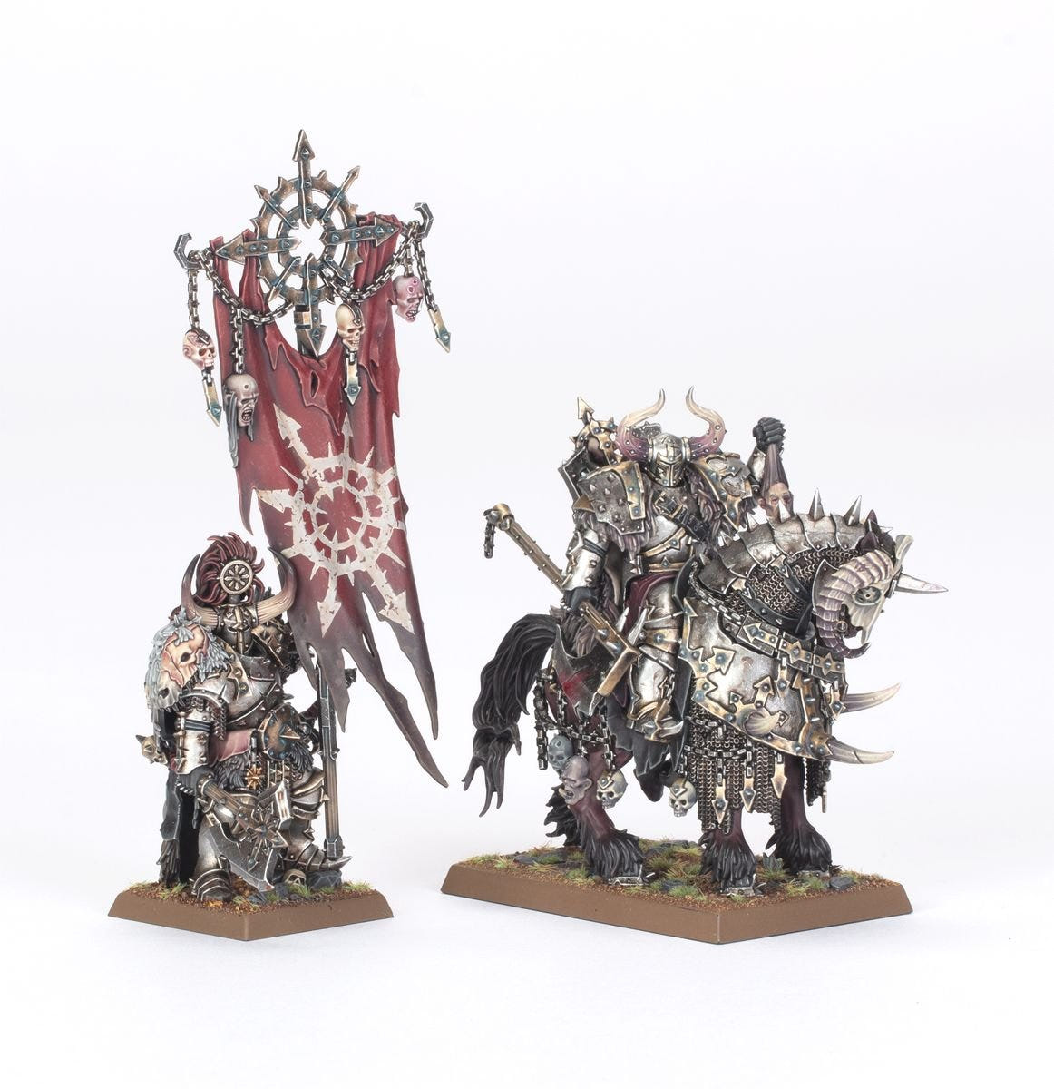 Warriors of Chaos standard bearer with a Chaos Star banner beside a mounted lord