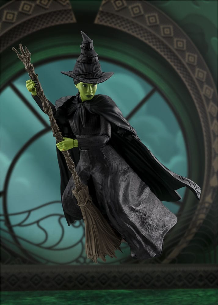 Wicked S.H.Figuarts Elphaba figure striding forward with broom and cloak swept back