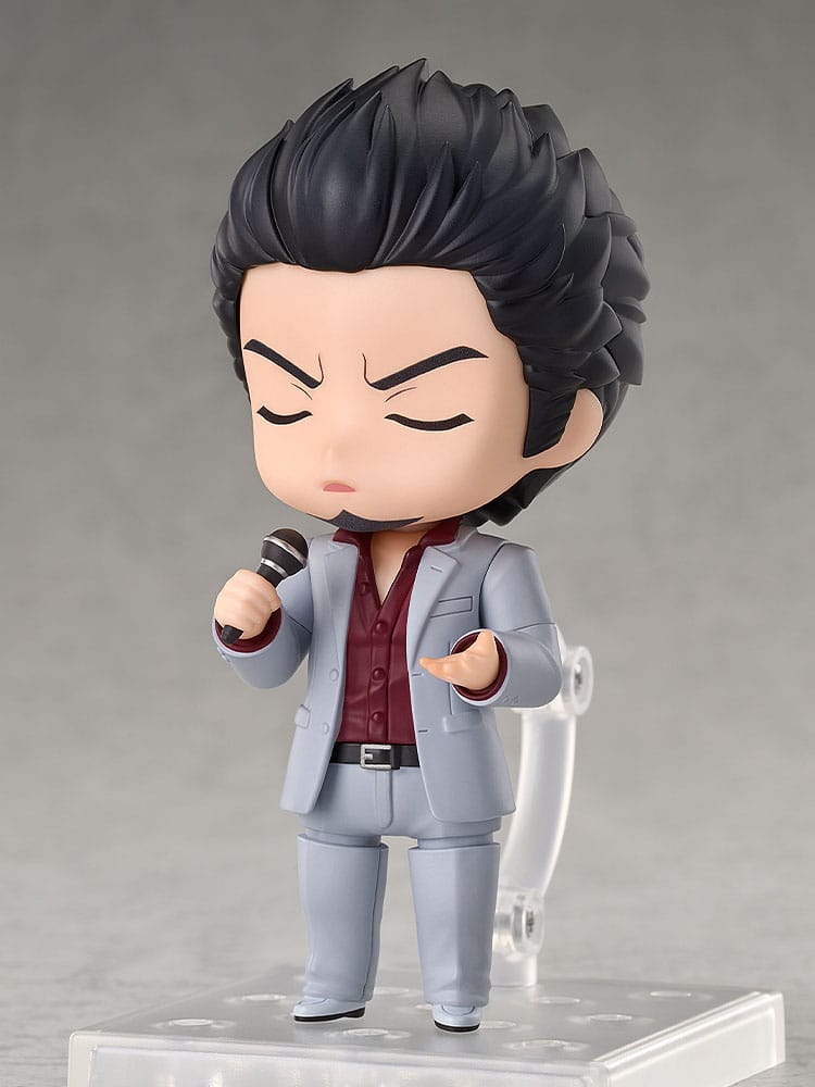 Kazuma Kiryu Nendoroid with singing faceplate holding a karaoke microphone