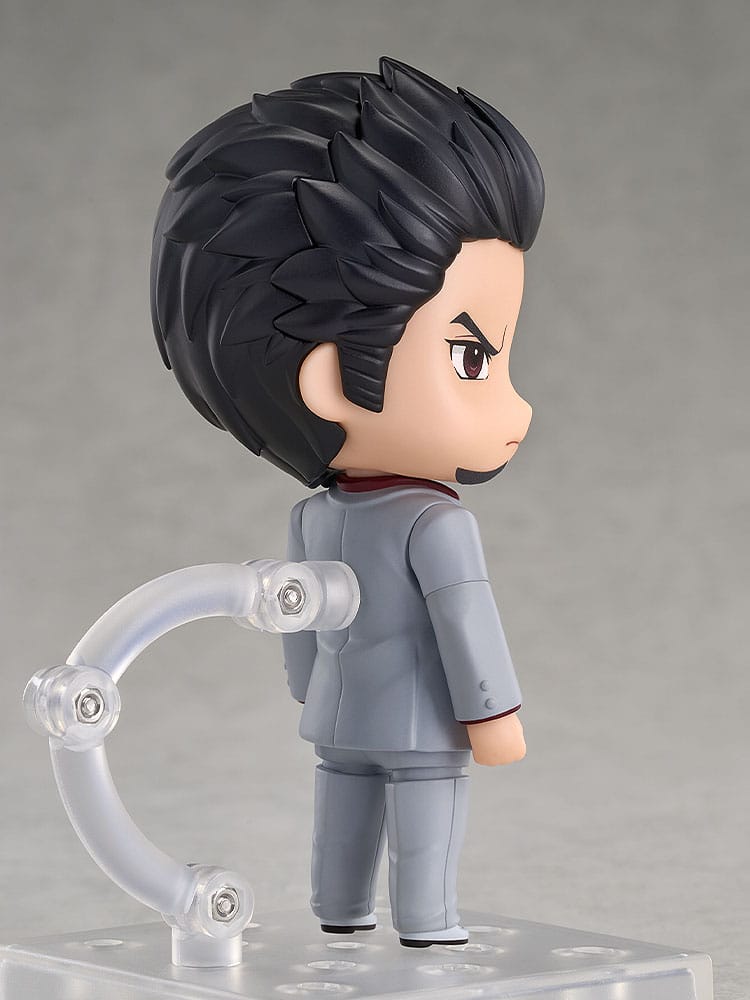 Side profile of the Kazuma Kiryu Nendoroid showing his swept-back black hair